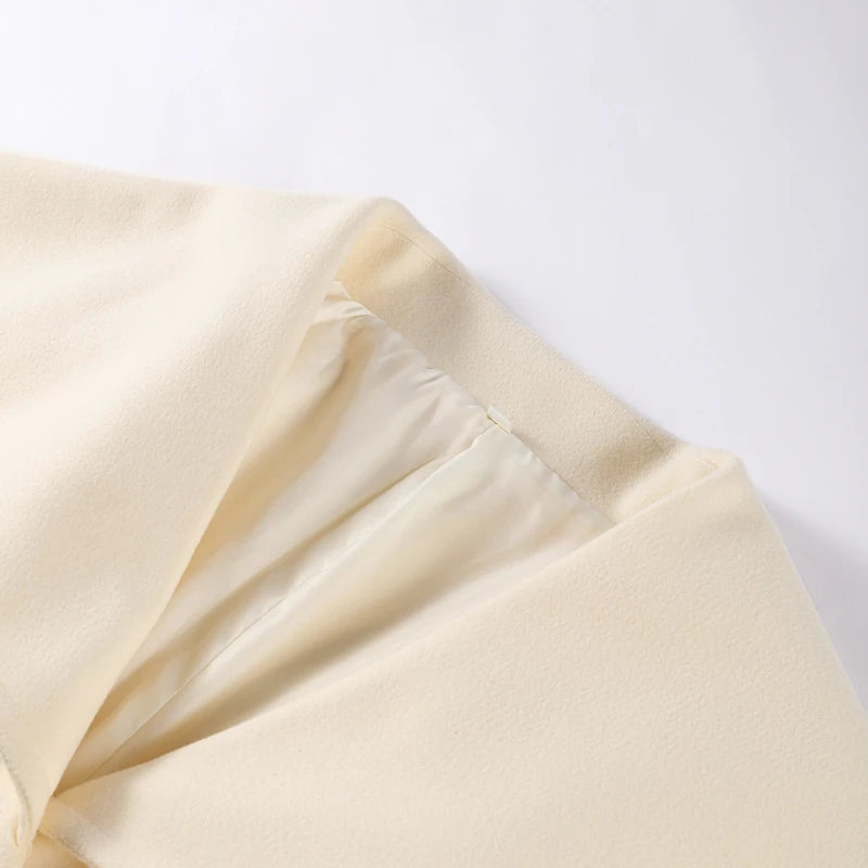 L'ÉPURE ROBE-MANTEAU LONGUE À COL CAPE